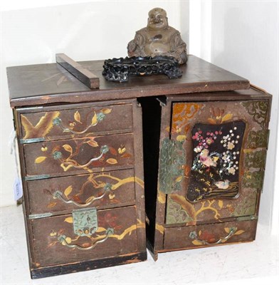 Lot 260 - A Japanese lacquer cabinet and a Buddha on stand