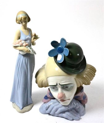 Lot 278 - A Lladro ";Pensive Clown"; 5130 issued 1982, retired 2000; together with a Nao figure of a...