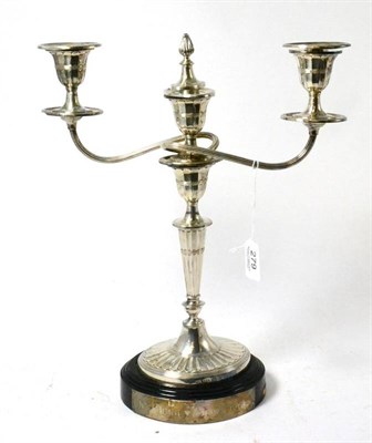 Lot 279 - A silver three branch candlestick, Sheffield, 1966 with ebonised presentation base