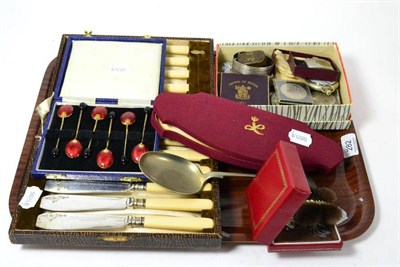 Lot 282 - A miscellaneous collection of items including a set of six enamel and silver gilt coffee bean...