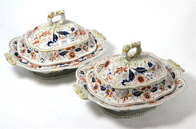 Lot 285 - A pair of 19th century ironstone tureens and covers