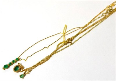 Lot 295 - An 18ct gold emerald and diamond pendant on chain and two emerald and diamond pendants on chains