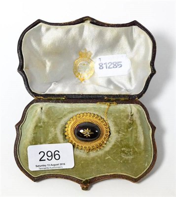 Lot 296 - A Victorian cabochon garnet and diamond brooch, in original case