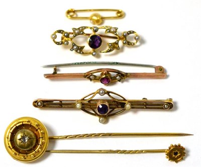 Lot 300 - An Edwardian 9ct gold seed pearl and amethyst set bar brooch, a gem set bar brooch stamped...