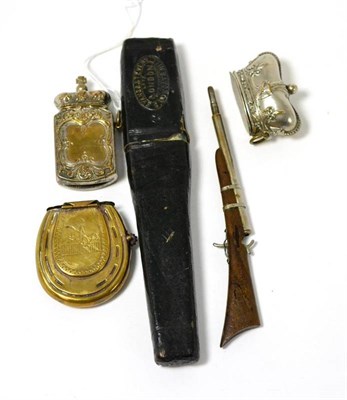 Lot 311 - Three various vesta cases, a sporting gun propelling pencil and a quill cutter