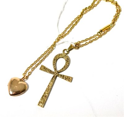 Lot 328 - A diamond set heart locket on chain and a 9ct gold Ankh cross pendant