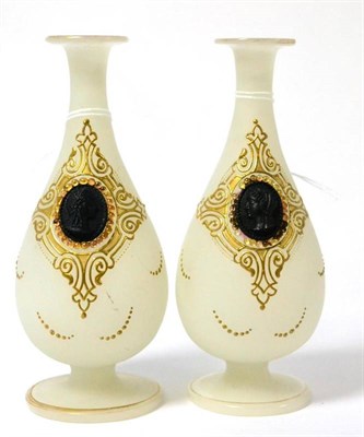 Lot 348 - A pair of French opaque glass vases with applied cameos (2)