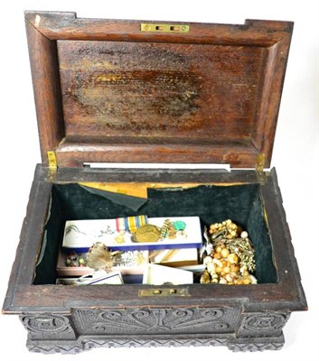 Lot 394 - A collection of costume jewellery including Scottish interest contained within a carved box