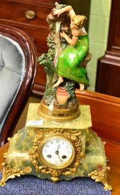 Lot 402 - A green onyx striking spelter mounted mantel clock (a.f.)