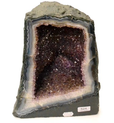 Lot 524 - An Amethyst Geode, 36cm high, 26cm wide (max)