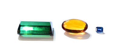 Lot 629 - A Sapphire, believed 0.59ct, probably synthetic; A Citrine, believed 10.05ct; and A Green...