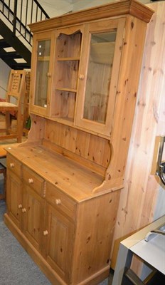 Lot 1013 - A modern pine dresser with glazed top