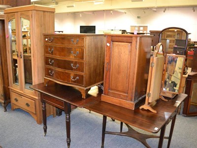 Lot 1022 - Reproduction four height chest of drawers, chamber cupboard, table mirror, coal purdonium and a...