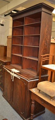 Lot 1027 - A Victorian mahogany and pine bookcase on cupboard base