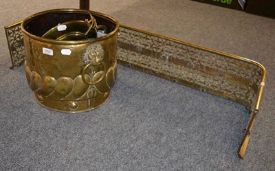 Lot 1062 - A brass fender, a door stop, jardiniere etc