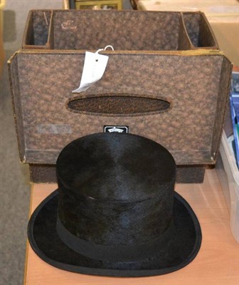 Lot 1066 - A silk top hat in case