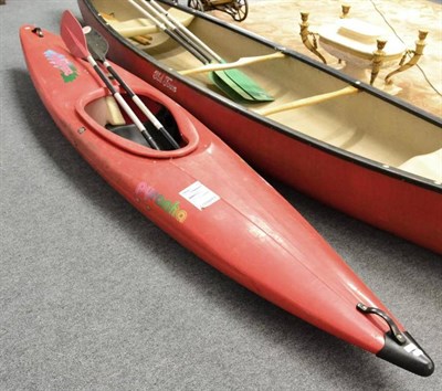 Lot 1071 - Pyranha kayak with paddles