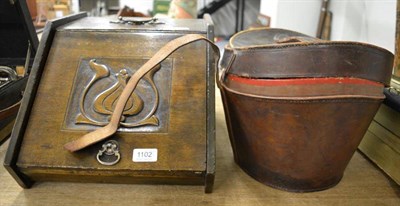 Lot 1102 - A top hat in fitted case and a coal scuttle