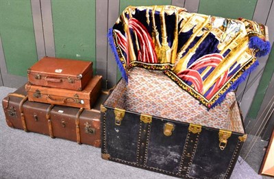 Lot 1141 - A large cabin trunk, a wood bound trunk, two small stitched leather suitcases and a Belgian machine