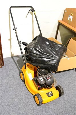 Lot 1143 - A McCulloch petrol lawn mower with Briggs and Stratton engine