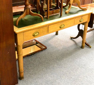 Lot 1165 - A late 19th/early 20th century library table with three drawers