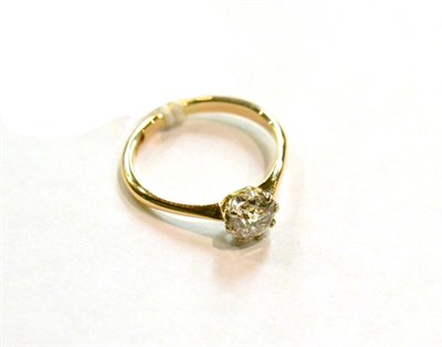 Lot 345A - An 18ct gold old cut diamond solitaire claw set ring with knife edge shoulders