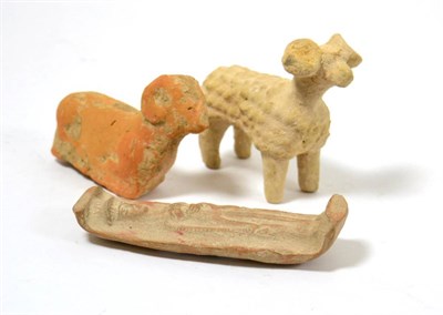 Lot 19 - A Greek archaic terracotta model of a ram, in stylised form, circa 4th-6th century BC, 10cm wide; a