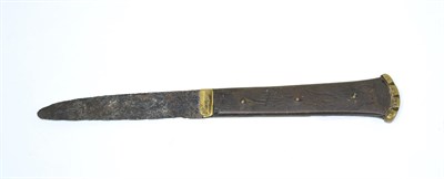 Lot 40 - A Tudor iron dagger with brass mounted wooden handle, circa 1500-1600 AD, length 20cm
