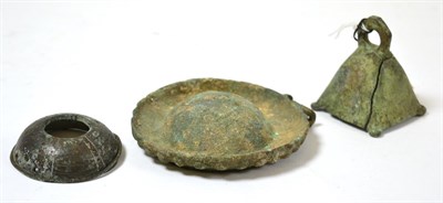 Lot 45 - A Roman bronze weight, circa 1st century AD, of flared form now missing lead, 5cm high, bears label