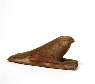Lot 50 - An Egyptian carved wooden model of Horus as a falcon, Late to Ptolemaic period circa 664-30 BC,...