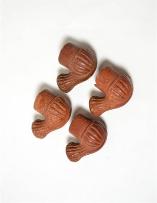 Lot 57 - Four North African terracotta fluted pipes, 19th-20th century, each around 4.5cm-5cm long