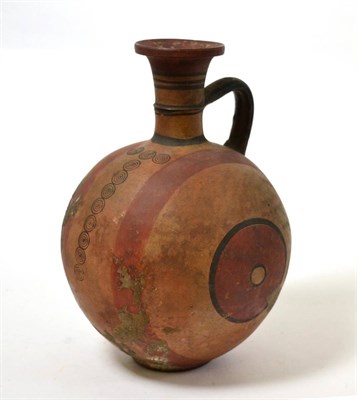 Lot 63 - An Eastern Mediterranean painted terracotta jug, medieval period, decorated with continuous...