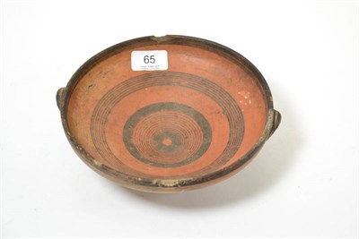 Lot 65 - A South Italic terracotta footed bowl circa 5th-3rd century BC, with twin handles and...