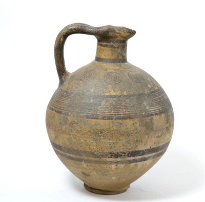 Lot 68 - An Eastern Mediterranean terracotta oinochoe/wine jug, circa 5th-3rd century BC, with small...