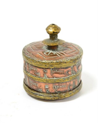 Lot 80 - A Tibetan copper prayer drum container, 19th century, of continuous stylised script decoration...