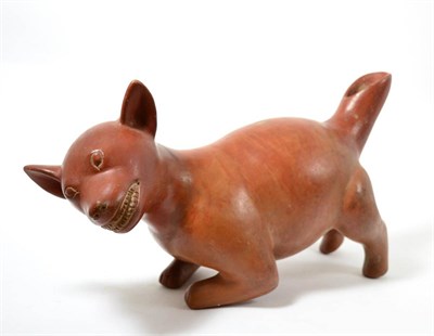 Lot 91 - A Pre-Columbian terracotta dog vessel, in the Colima style of 100BC-300AD, modelled in the...