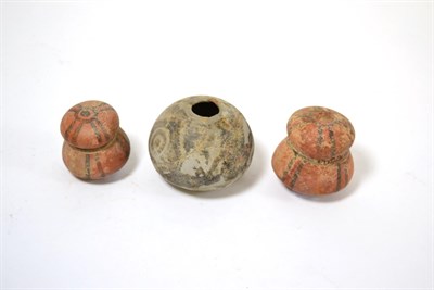 Lot 95 - A Pre Columbian painted terracotta implement, possibly a pestle or pounder, 5.5cm high with another