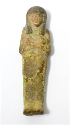 Lot 100 - An Egyptian painted terracotta shabti, XVIII-XX dynasty, modelled in the round with painted detail