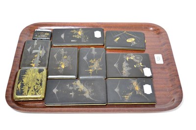 Lot 123 - Nine Japanese inlaid metal cigarette cases and a similar lighter