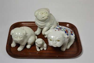 Lot 124 - Four Japanese porcelain dogs, including an ";Imari"; decorated example (4)