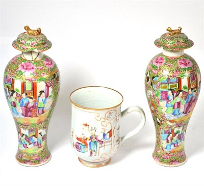 Lot 148 - A pair of Cantonese vases, 32cm high (including covers) and an 18th century Chinese mug, 15cm...