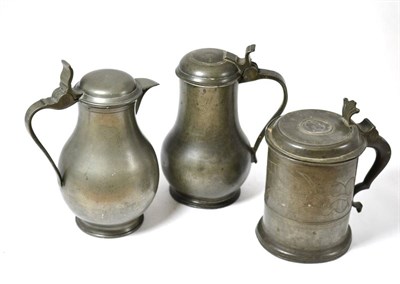 Lot 170 - Late 18th century Dutch pewter flagon together with a tankard and a Flemish flagon
