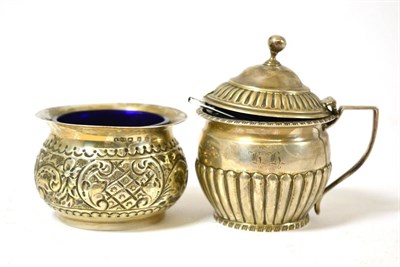 Lot 178 - A silver mustard with hinged lid and a salt