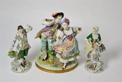 Lot 182 - Sitzendorf group, 21cm high and a pair of Sitzendorf figures, 17cm high