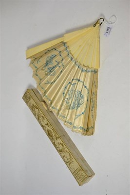 Lot 185 - An early 20th century ivory fan with silk mount embroidered in blue and cream silks with 18th...
