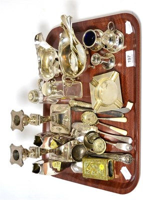 Lot 197 - A group of silver including, two sauce boats, a three piece cruet set, an ash tray, two silver...