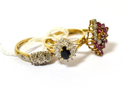 Lot 239 - A 9ct gold diamond triple cluster ring, a 9ct gold sapphire and diamond cluster ring and a 9ct gold