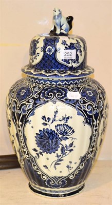 Lot 252 - A modern decorative blue and white vase and cover