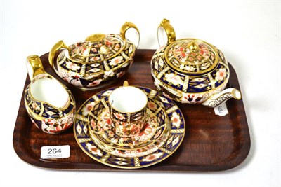 Lot 264 - Royal Crown Derby Imari pattern items, consisting of a teapot, coffee cup and saucer, side...