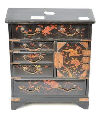 Lot 275 - A Japanese lacquered table cabinet